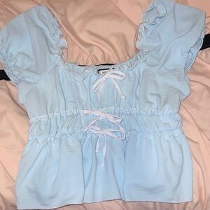 Discreet Sky Blue Lace-Up Blouse